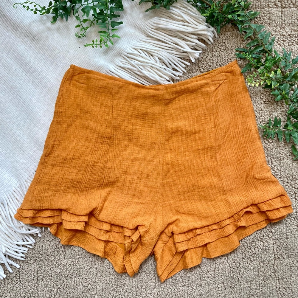E2 Orange Ruffle-Hemmed Shorts